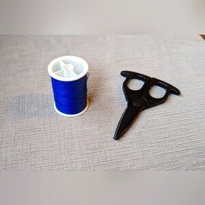 Small Sewing Scissors and Navy Blue Thread